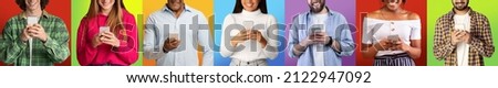 Smiling adult and young multiracial people in bright casual, checking social networks, chatting on smartphones, on colorful background, panorama, studio shot, collage. New normal, online app and ad