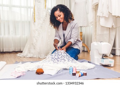 Smiling African American Black Woman Fashion Designer Working At Workshop Studio