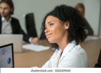 Smiling African American Businesswoman Looking To Future Thinking Of Business Success At Meeting, Dreamy Absent-minded Black Employee Dreaming Of Vacation Or Making Career Plans, Head Shot Portrait