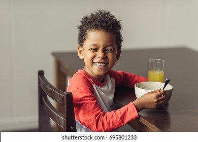 Smiling African American Kid Eating Healthy Breakfast