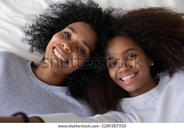 Smiling African American Mommy Daughter Relax Miscellaneous