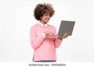 Smiling African American Teen Girl, High School Or Online Course Student Holding Laptop, Isolated On Gray Background