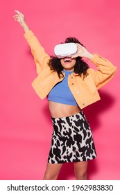 smiling african american woman in vr headset on pink - Shutterstock ID 1962983830