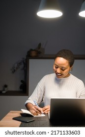 Smiling African American Woman Working Late From Home