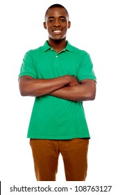 Smiling African Guy With Crossed Arms Against White Background