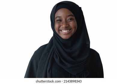 Smiling African Muslim Pre-teen Wearing Black Hijab Smiling At Camera On White Background