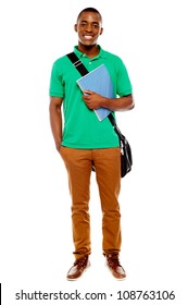 Smiling African Student Carrying Laptop Bag And Notebook, Full Length Portrait