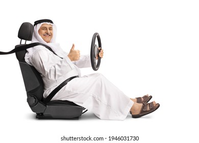 Smiling Arab Man In A Driver Seat Holding The Steering Wheel And Showing A Thumb Up Sign Isolated On White Background