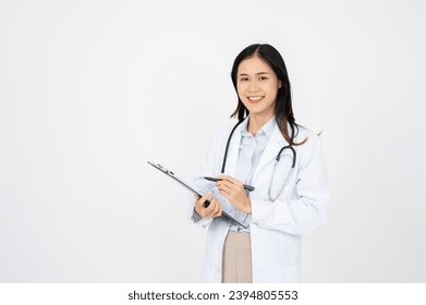 Smiling Asian female doctor woman in white medical gown hold clipboard with medical documents isolated on blue background. Healthcare personnel medicine health concept. Mock up copy space. - Powered by Shutterstock