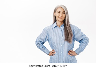 Smiling Asian Lady, Senior Korean Woman, Looking Confident, Standing Against White Background