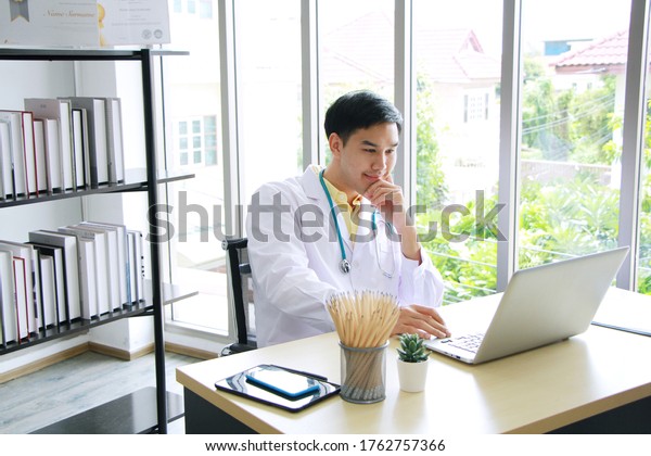 Smiling Asian Psychiatrist Md Man Doctor Stock Photo (Edit Now) 1762757366