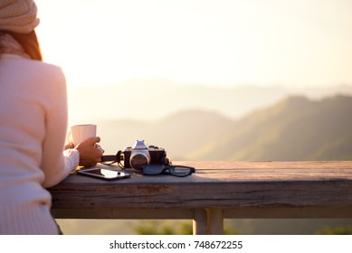 Smiling Asian Woman Drinking Coffee And Tea And Take A Photo And Relax Enjoy In Sun Sitting Outdoor In Sunshine Light Enjoy Relax Her Warm Morning At Balcony House, Vintage. Lifestyle Concept