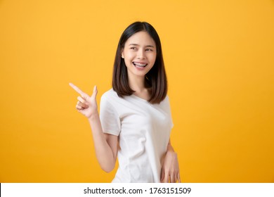 Smiling Asian Woman Stand Pointing Finger Stock Photo 1763151509 ...