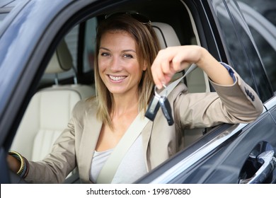 Smiling Attractive Woman Holding Brand New Car Keys