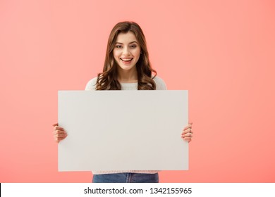 smiling and attractive woman holding empty board with copy space isolated on pink - Shutterstock ID 1342155965