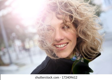 Smiling Attractive Woman In Town In Winter Time