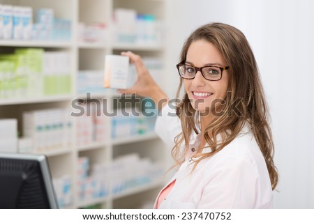 Similar – Image, Stock Photo Female chemist hand holding magnifying glass to analyze golden glitter sample on petri dish in lab