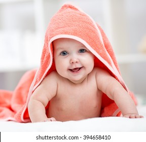 Smiling Baby Girl After Shower Or Bath With Towel On Head