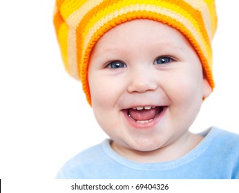 Smiling Baby Girl Showing Teeth Wearing A  Hat  Isolated On White Background