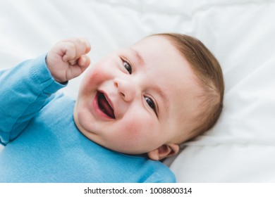 Smiling Baby With Winner Attitude