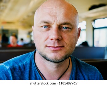 Smiling Bald Man On The Train