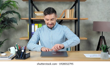 Smiling Bearded Businessman Sitting On Chair At Desk In Home Office Open And Start Using Laptop. Business Man Work Prepare Online Remote Video Conference Call Webcam Distance Meeting Chat In Computer