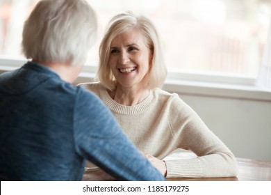 Smiling Beautiful Mature Woman Listening To Elderly Man Talking, Senior Happy Retired Family Enjoying Pleasant Conversation, Senior Couple Dating Concept, Good Relations Love In Older People Marriage