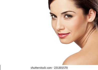 Smiling Beautiful Woman Posing On A White Background