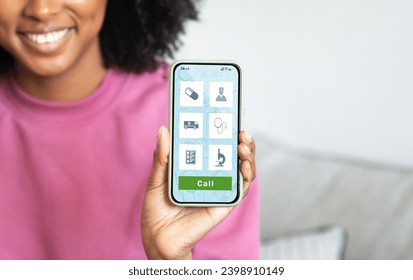 Smiling black woman demonstrating healthcare app opened on her smartphone, african american female recommending modern application for online medical services, advertising telemedicine, collage - Powered by Shutterstock