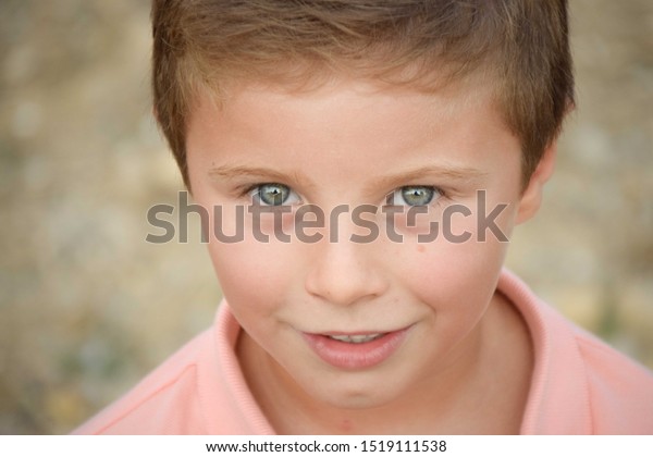 Smiling Blonde Kid Blue Green Eyes Stock Photo Edit Now 1519111538