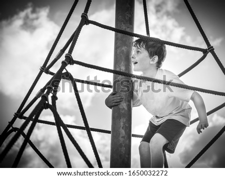 Similar – lovely little girl on a children’s slide