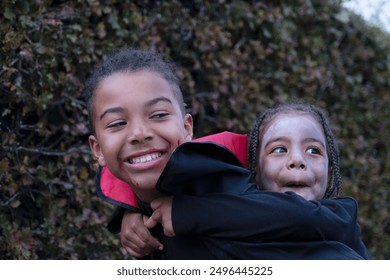 Smiling boys in Halloween costumes - Powered by Shutterstock