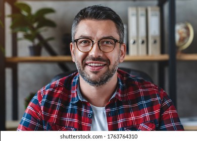 Smiling business man looking camera webcam making conference video call - Shutterstock ID 1763764310