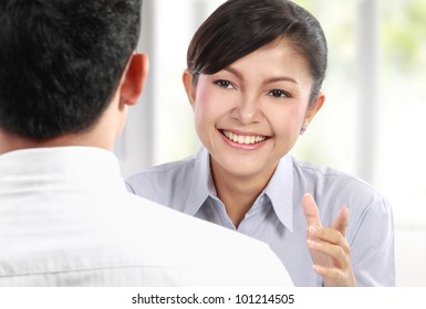 Smiling Business People Talking On Business Meeting At The Office