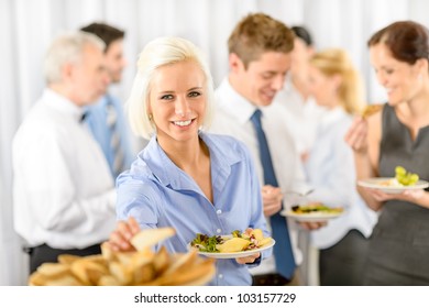 Smiling Business Woman During Company Lunch Buffet Hold Salad Plate