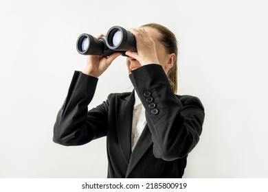 Smiling business woman in jacket looking through binoculars on white background. - Powered by Shutterstock