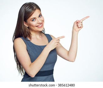 Smiling business woman pointing finger on copy space. iswolated portrait.