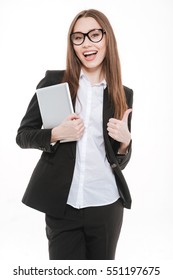 Smiling Business Woman Standing With Tablet Computer And Showing Thumb Up Isolated On A White Background