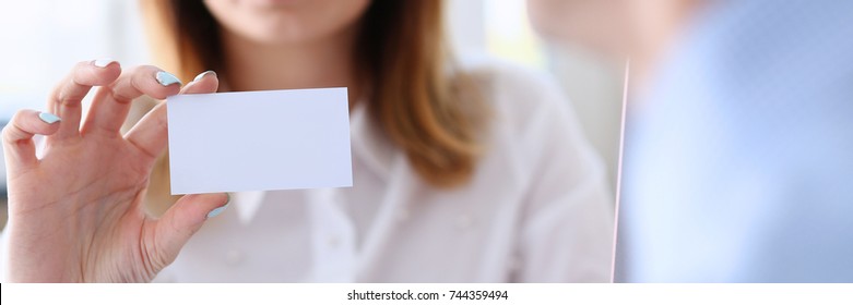 Smiling Business Woman In Suit Hold In Hand Blank Calling Card Closeup. White Collar Partners Company Name Exchange Executive Or Ceo Introducing At Conference Product Consultant Sales Clerk Concept