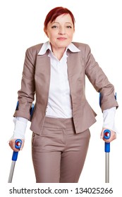 Smiling Business Woman Walking With Two Crutches