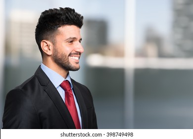 mens black suit with blue shirt