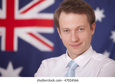 smiling businessman posing over australian flag - Powered by Shutterstock