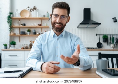 Smiling Businessman Webinar Speaker In Headset Looking At Camera Webcam View. Adult Business Coach Entrepreneur Having Interview, Hr Manager Consulting Customer, Freelancer Mentor Filming Vlog