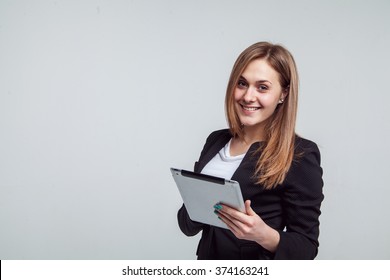 Smiling Businesswoman Holding Digital Tablet. Isolated On White