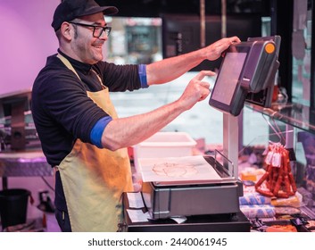 smiling butcher wearing glasses weighing the customer's meat purchase on a scale. The friendly demeanor of the butcher and the precision in weighing the meat showcase excellent customer service  - Powered by Shutterstock