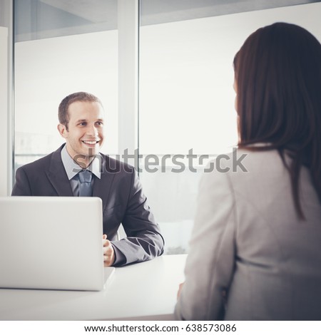Smiling candidate during a job interview.