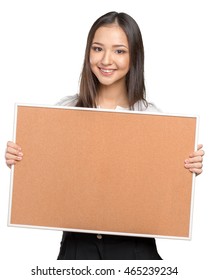 Smiling Casual Woman Holding The Empty Corkboard