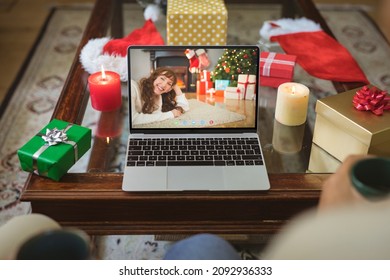 Smiling Caucasian Woman At Christmas Smiling On Laptop Video Call Screen. Christmas, Festivity And Communication Technology.