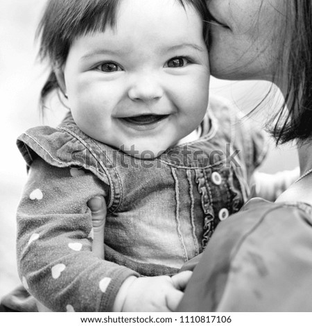 Similar – Image, Stock Photo Beautiful woman and her cute little daughter are hugging