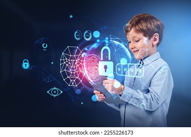 Smiling child boy using tablet, earth sphere hologram hud with lock and facial recognition hud. Concept of internet security and parental control